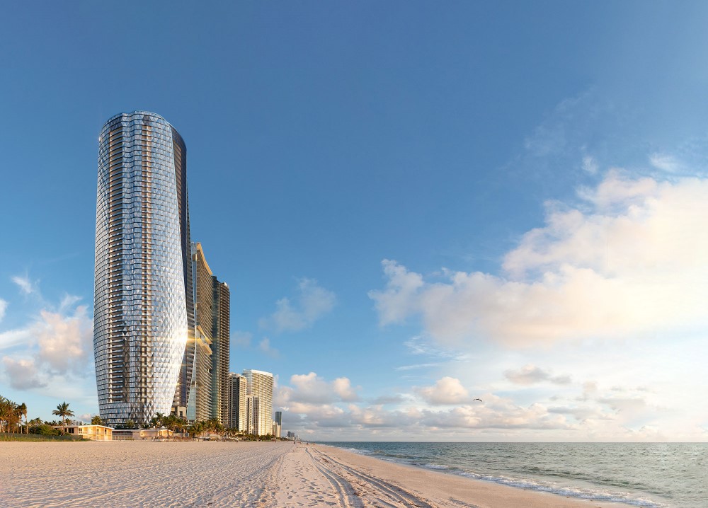 Exterior view of a stunning, glass sky-scraper right on the beach