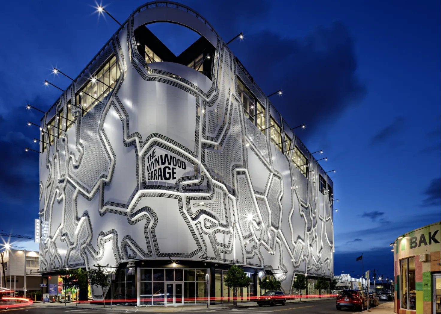 <h3>The Wynwood Garage</h3>
<p>This mixed-use building is instantly recognizable for its topographic architectural skin by Faulders Studio.</p>