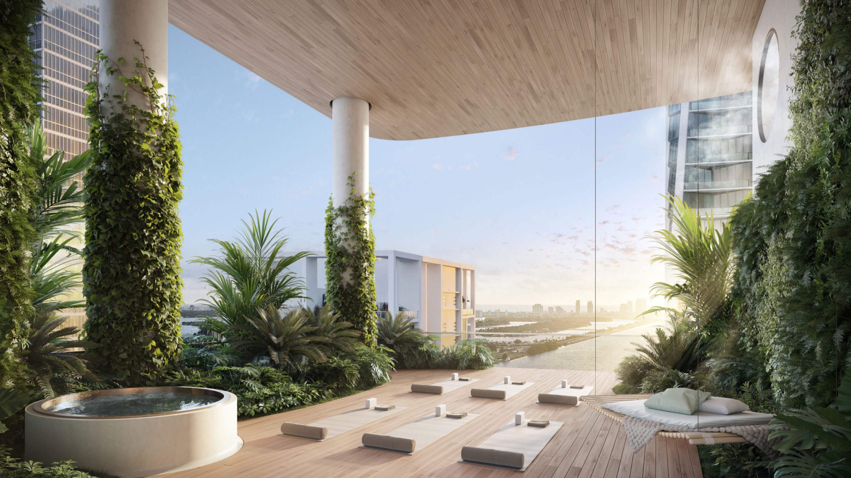Communal yoga room featuring hot tub and Atlantic ocean view