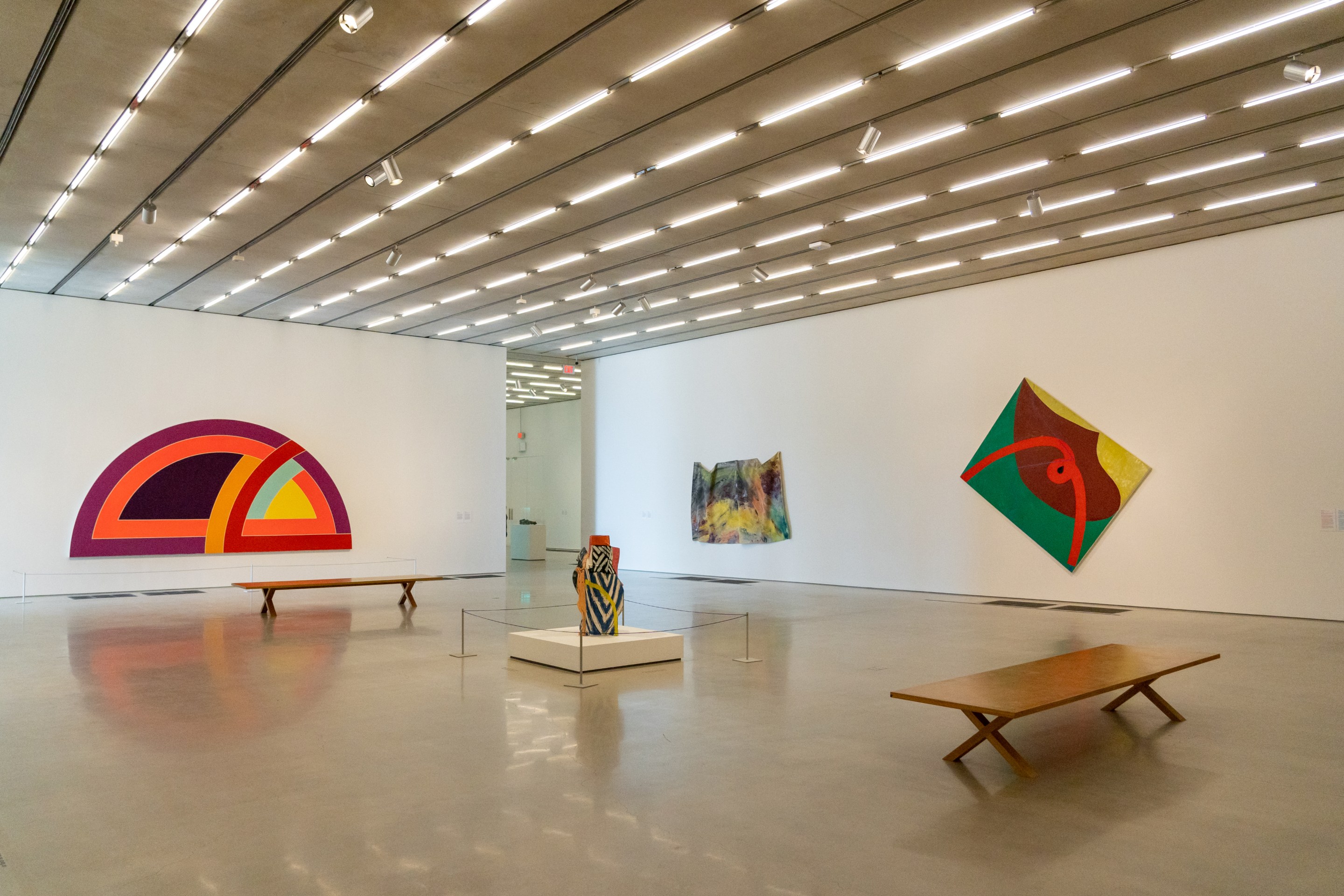 Modern art museum in Miami with a vase and portraits