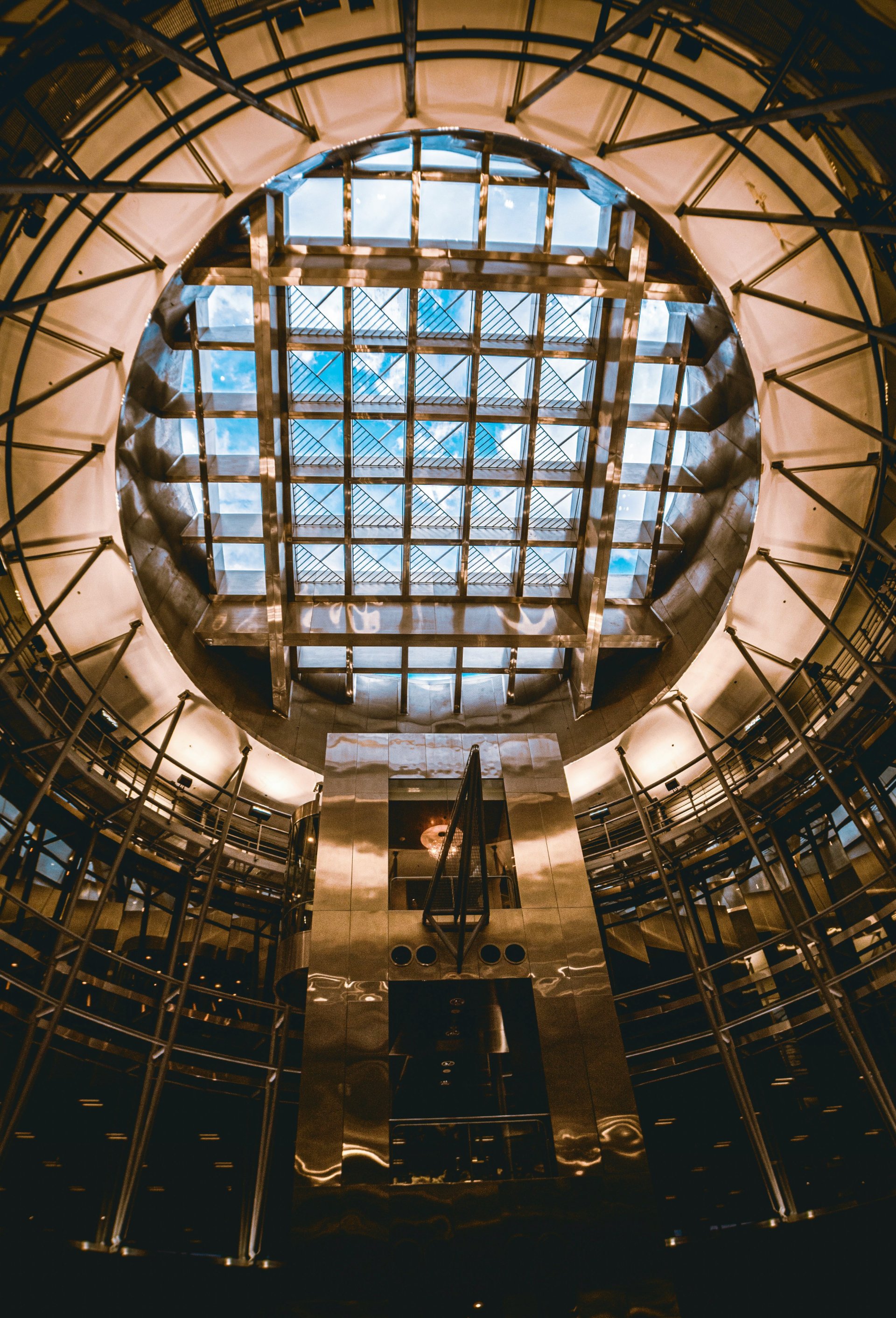 Modern steel architecture building interior featuring a sky view ceiling