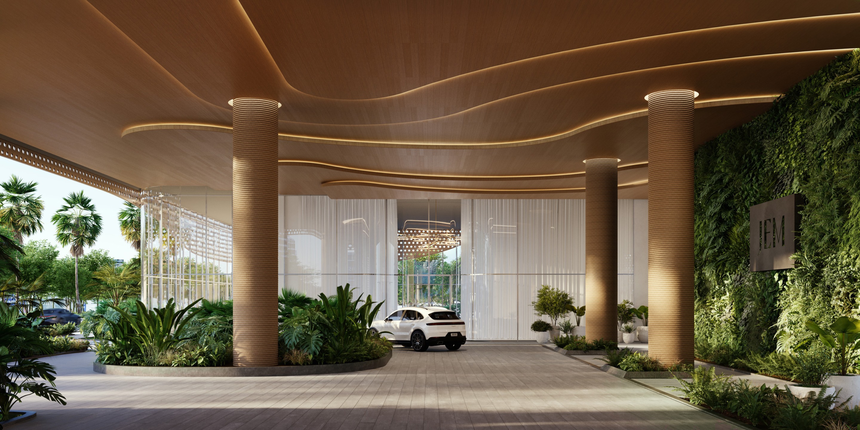 Lushly landscaped double height lobby driveway
