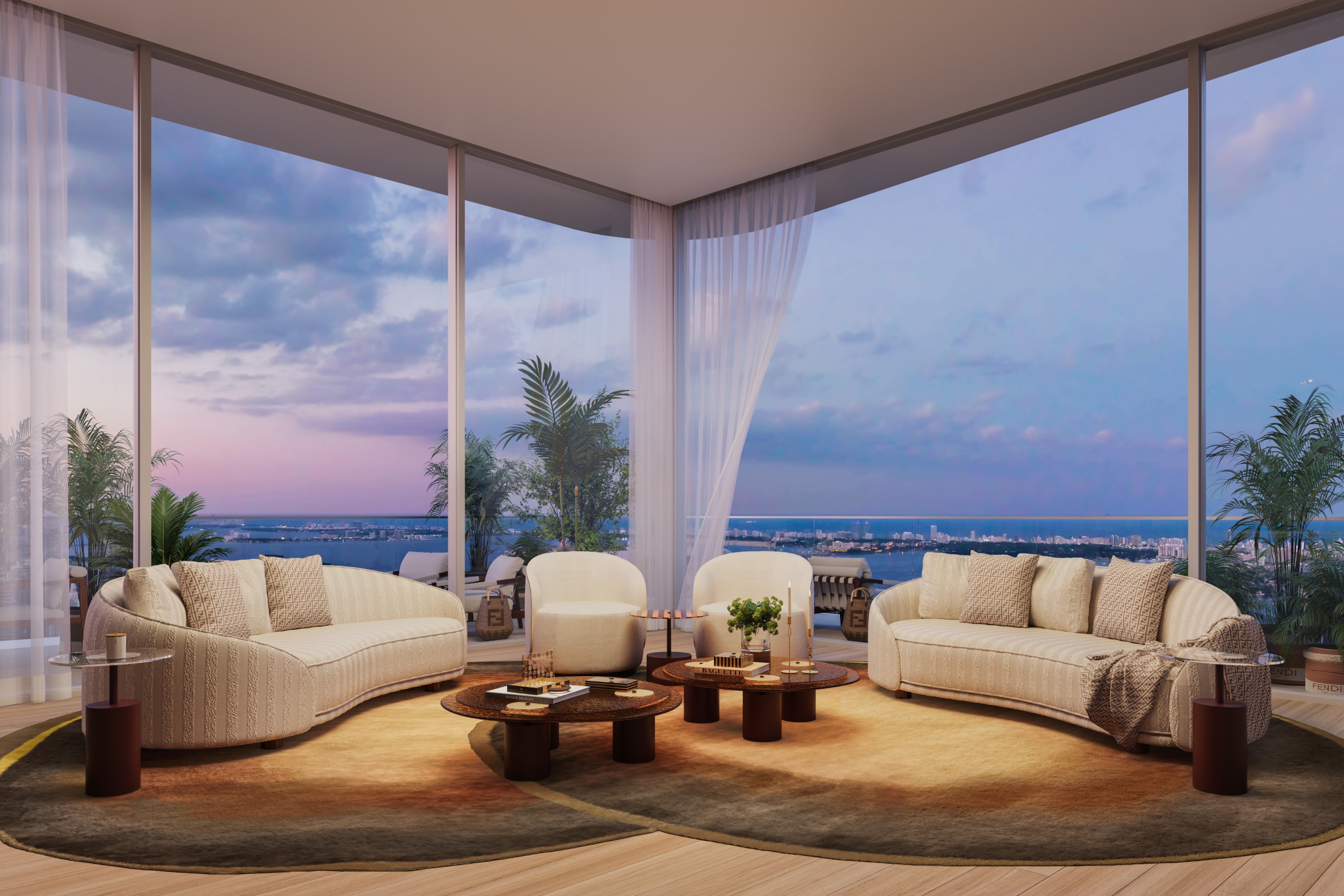 Interior view living room in Sky Villa in JEM building including floor to ceiling windows overlooking Miami cityscape